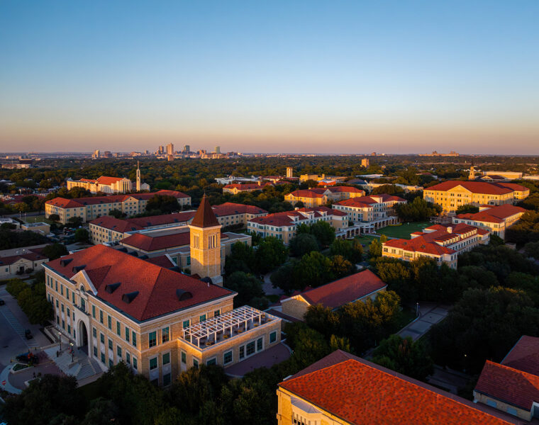 Aerial view of the TCU campus with downtown Fort Worth in the distance